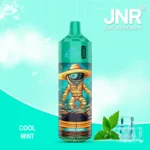 Vape jetable JNR Alien Cool Mint avec design extraterrestre unique, saveur menthe fraîche, capacité de 10000 Puffs et batterie de 850mAh.
